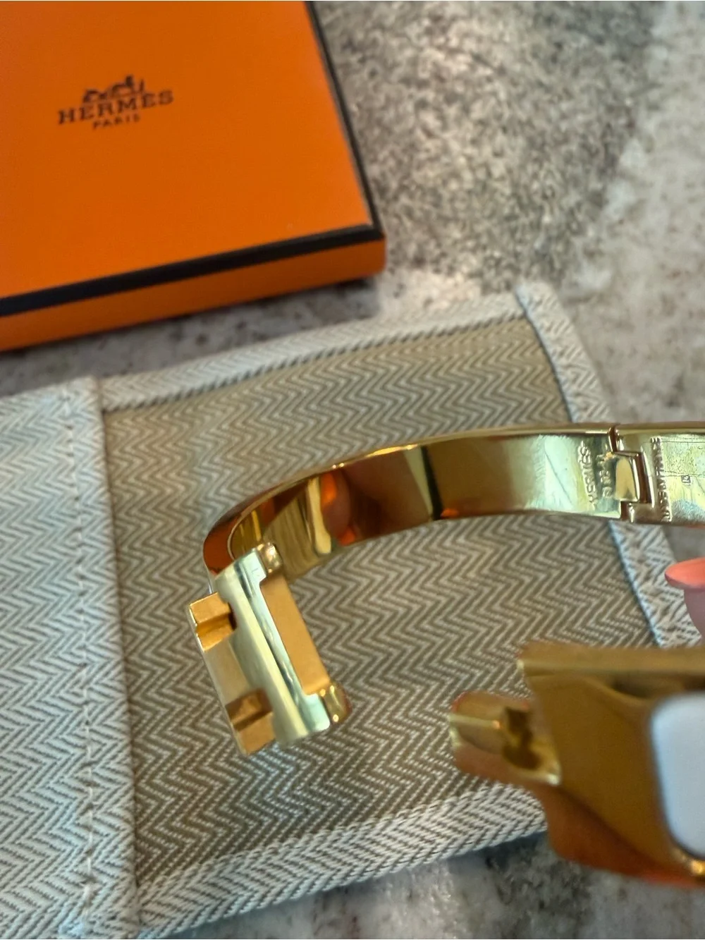 Hermès Clic H Gold and White Enamel Bracelet